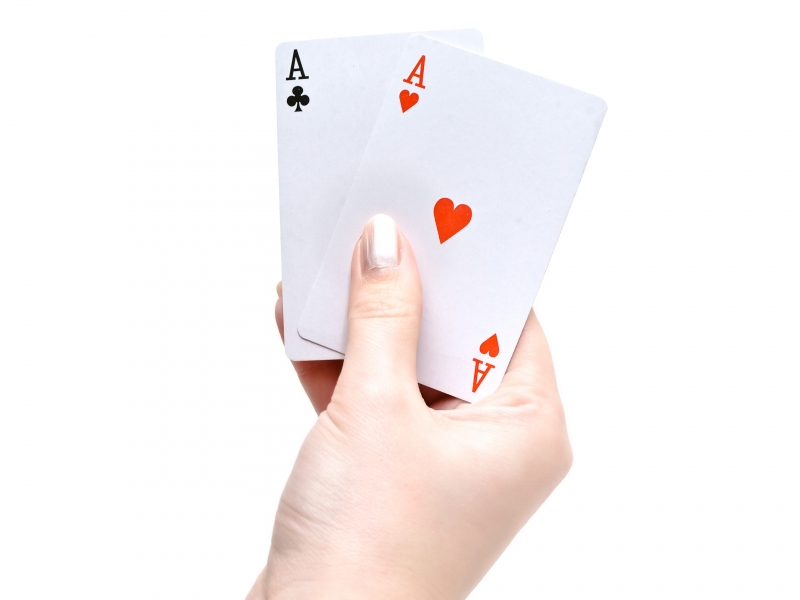 523560-cards-in-hand
